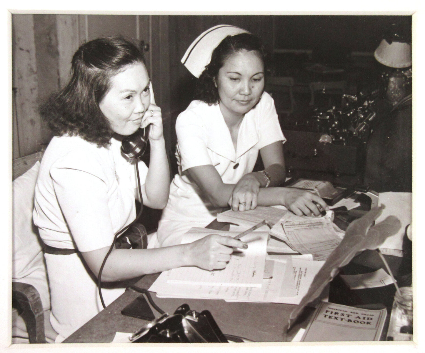 WWII ERA NURSES. 8X10 B&W PRINT IN 11X14 IN ARCHIVAL MAT.