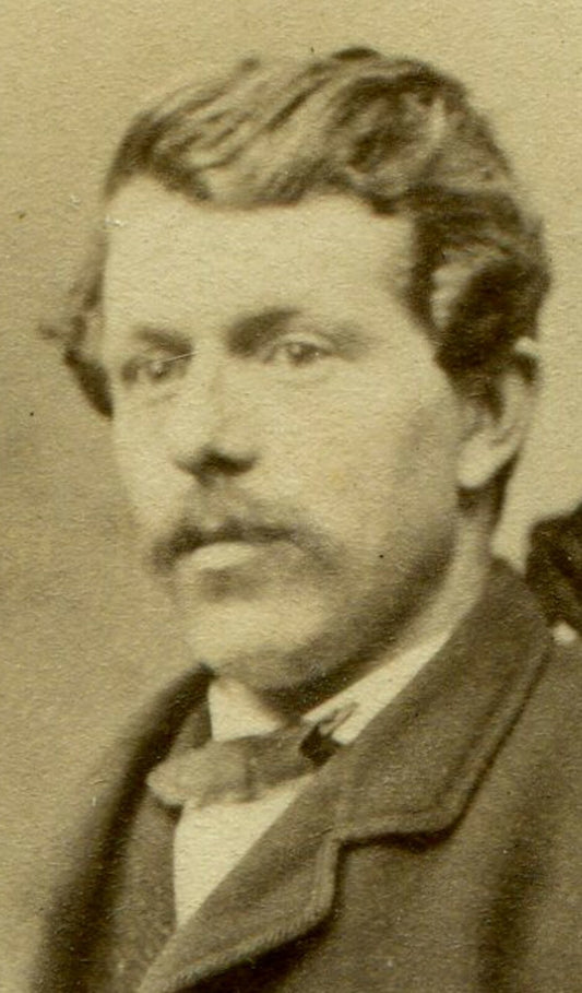 WAVY HAIRED MAN W/MUSTACHE. CDV. WHITECHAPEL, LONDON. MAKER MARK ON CARD BACK.