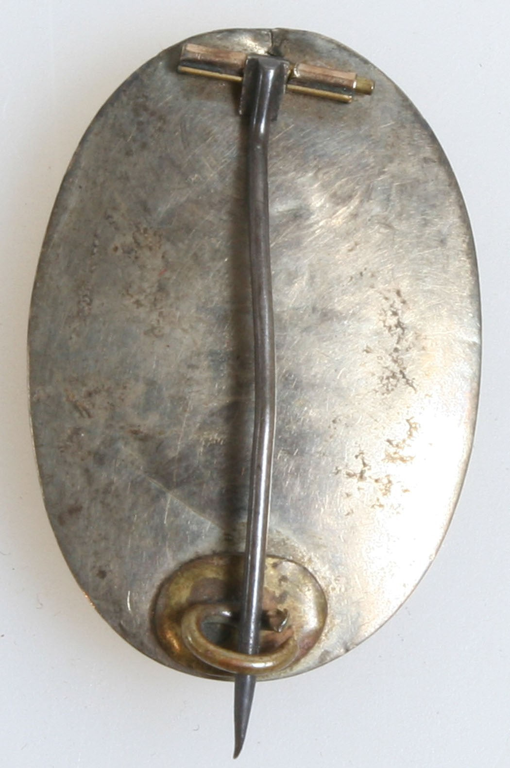 Pin, Jewelry, Tintype. Man With Short Pompadour. Gold Pin. 1860s.
