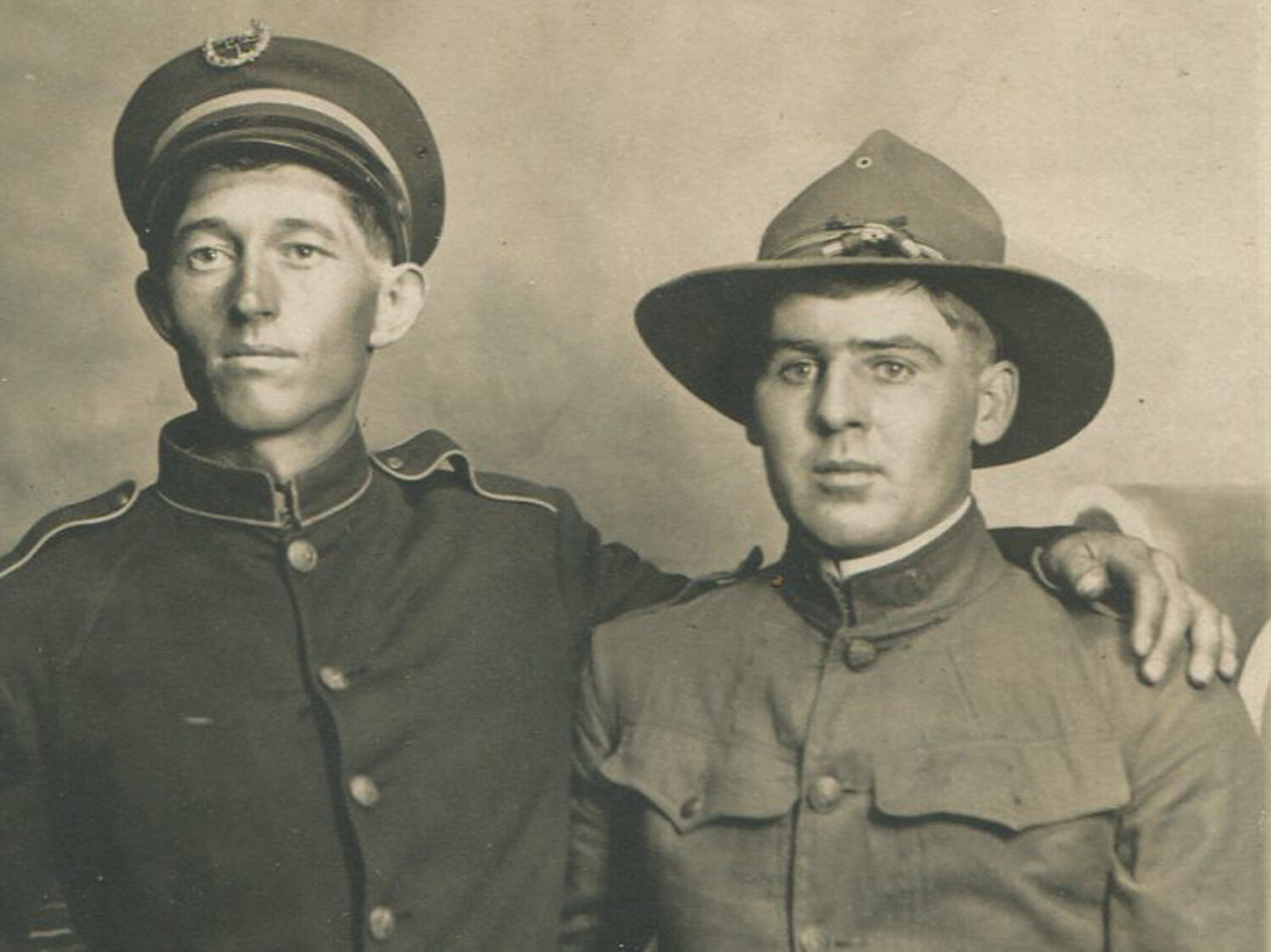 WWI ERA SOLDIER W/FRIEND.  4.75X3.5 PHOTO POSTCARD.