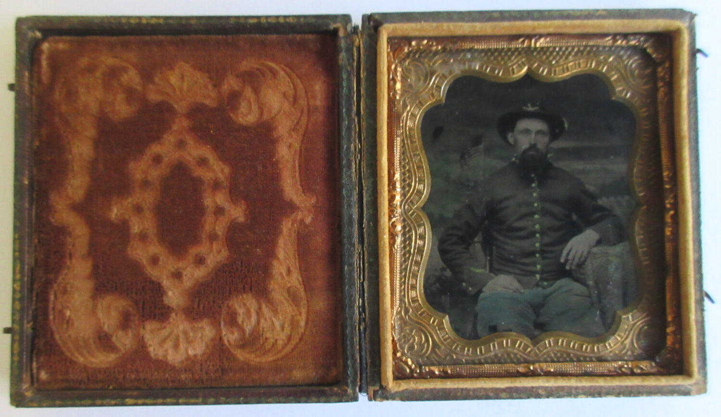 CIVIL WAR CAVALRYMAN IN UNIFORM. TINTED TINTYPE 6TH PLATE, FULL CASE.