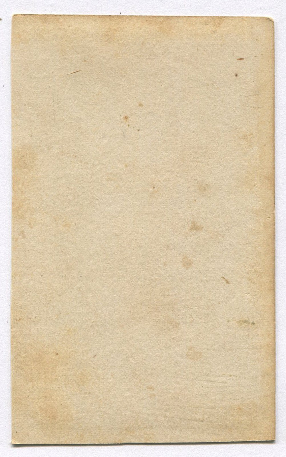 TALL GAUNT BOY IN BAGGY SUIT, HAT ON TABLE. CDV.