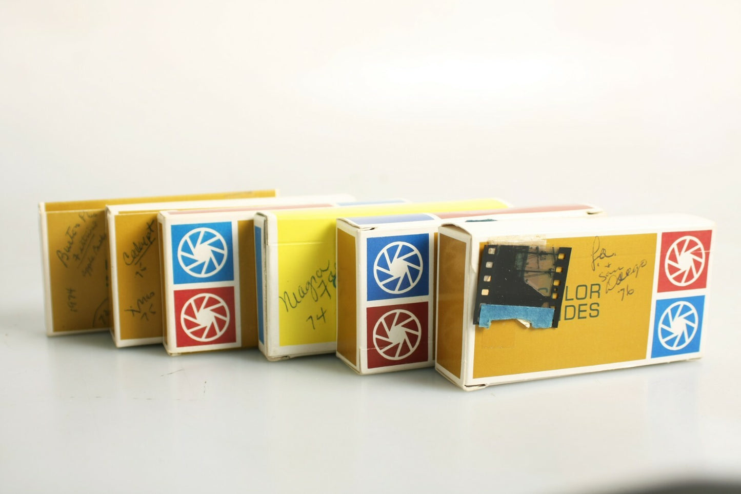 Pack of Six Found Boxes of 35mm Film Slides 150+