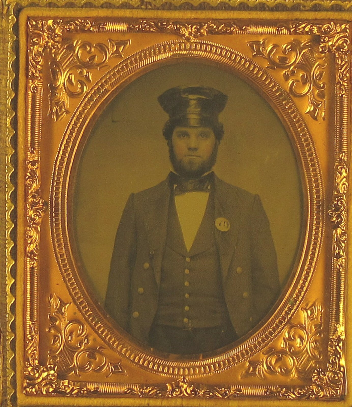 OCCUPATIONAL, FIREMAN/TRAIN OPERATOR. TINTED 6TH PLATE AMBROTYPE. FULL CASE.