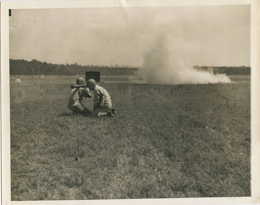 U.S. SOLDIER FIRING SHOULDER HELD WEAPON. WWII. (8X10 REPRINT)