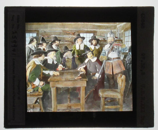 ACTORS PORTRAY PILGRIMS. HAND COLORED PHOTO ON GLASS. TINTED LANTERN SLIDE.