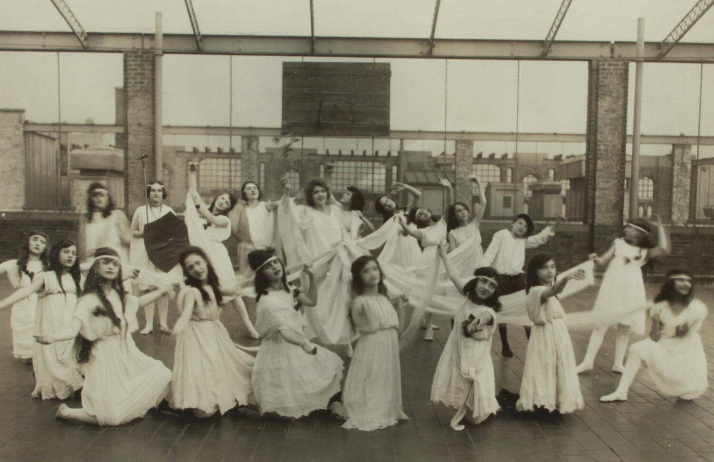 YOUNG WOMEN AND GIRLS DANCE ON ROOFTOP. 4X6.5 SILVER PRINT IN 8X10 FRAME.