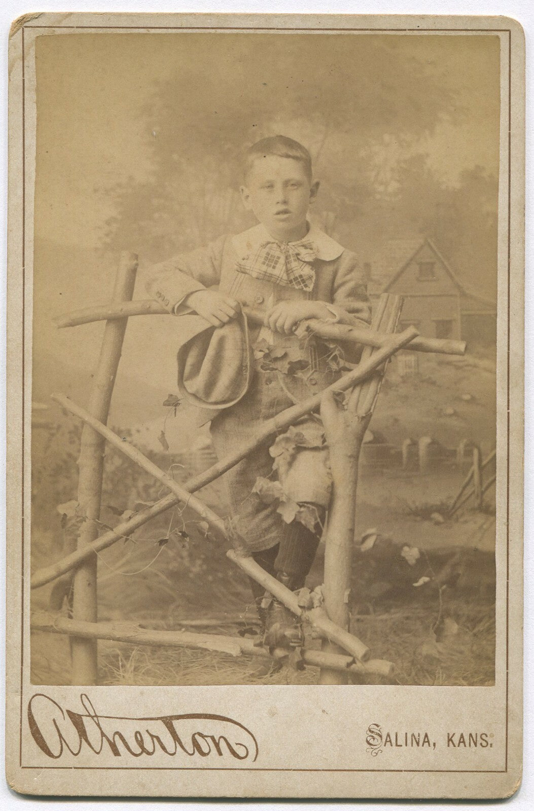 Cabinet Card Photo, Boy in Knickers Holding Hat, Rustic Setting, Salina KS