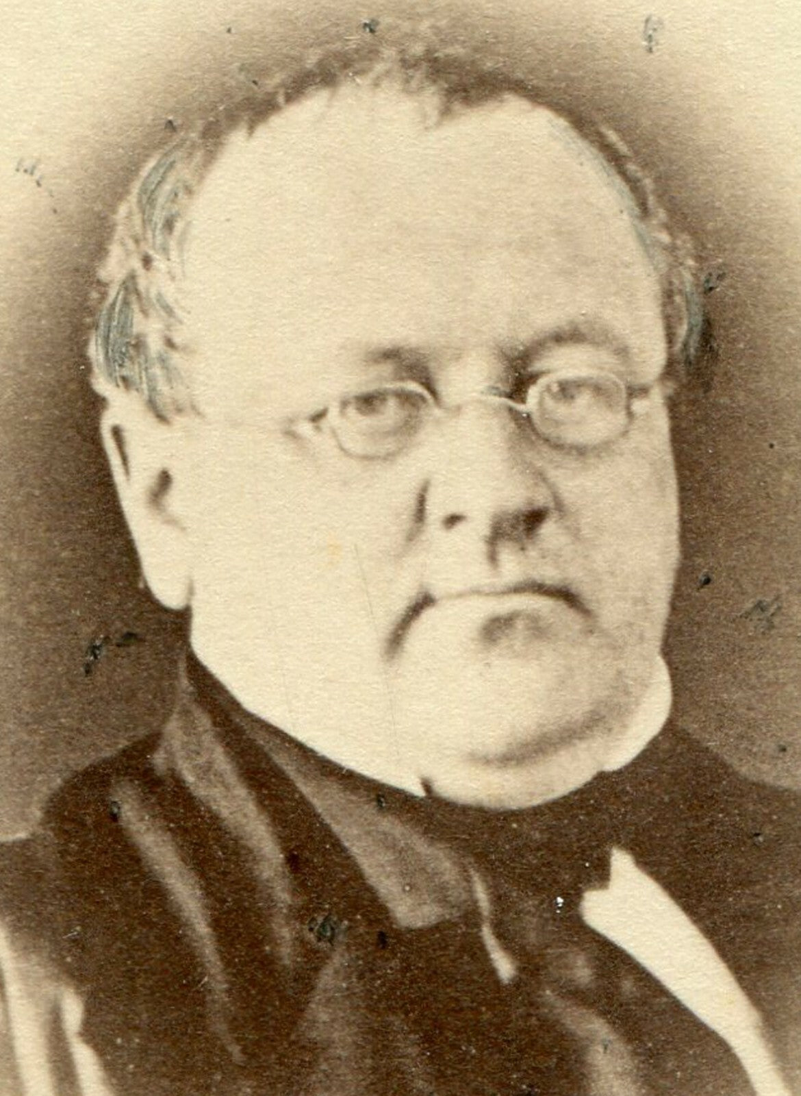 ROUND FACED ORDER MAN W/GLASSES. CDV.
