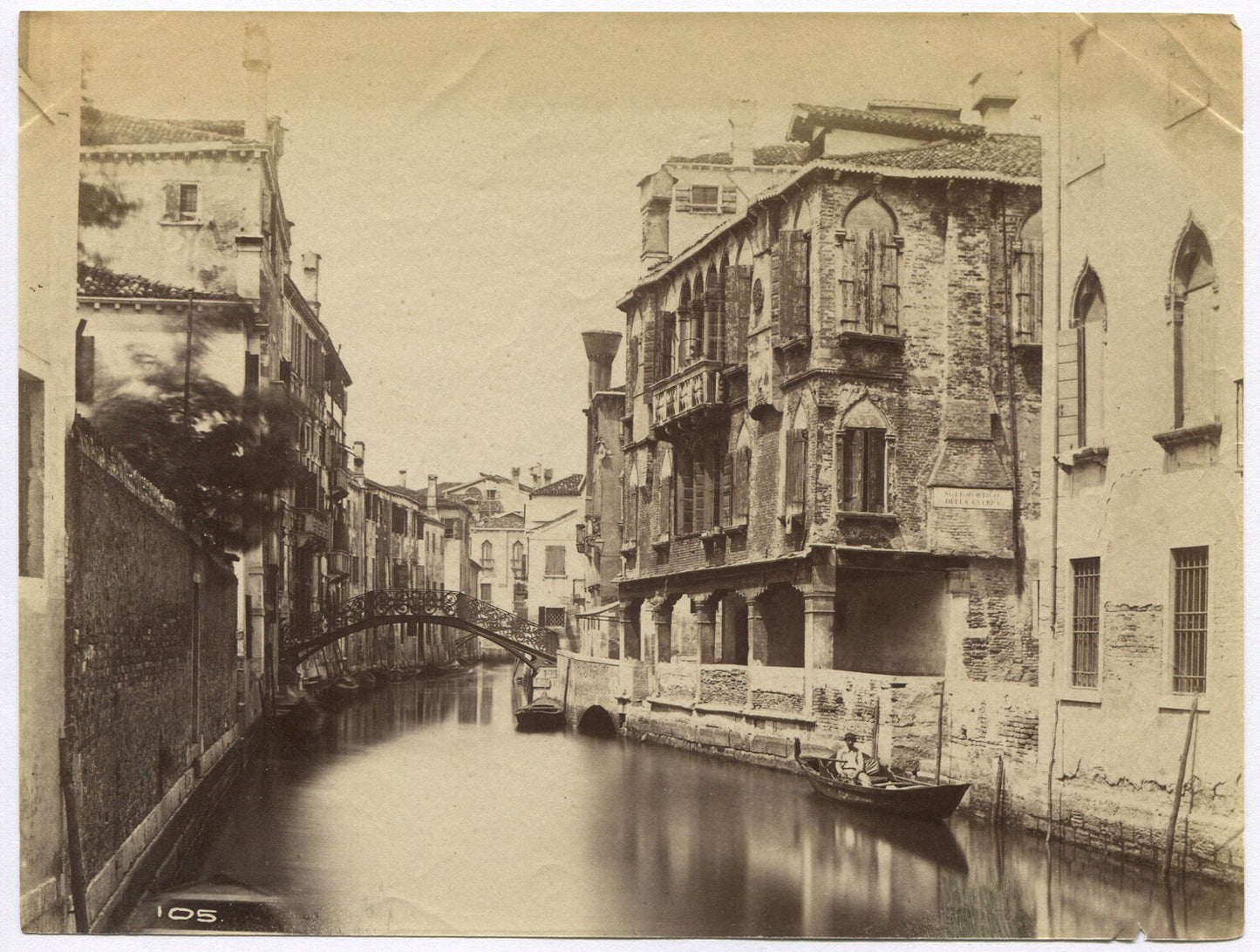 VENICE CANAL, GONDOLAS, BRIDGE, AND BUILDINGS. UNMOUNTED ALBUMEN.
