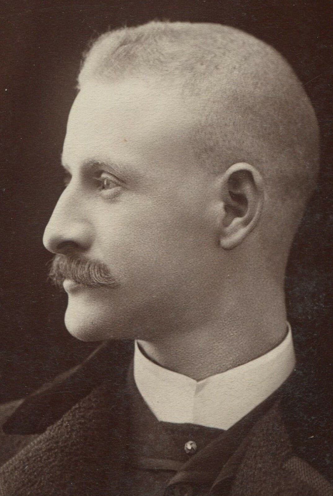 HANDSOME MAN W/MUSTACHE IN PROFILE. UNIQUE POSE. CABINET CARD.