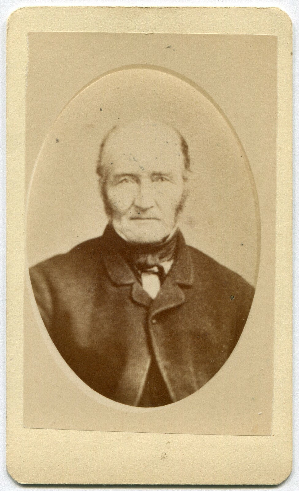MAN W/HAUNTING STARE. CDV. ST. JOHN, NEW BRUNSWICK, CANADA. MAKER MARK ON CARD B