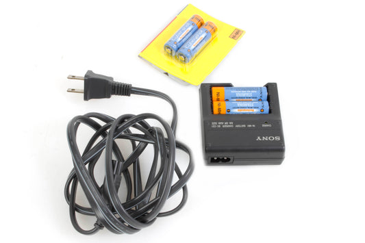 Sony BC-CS1 Battery Charger W/ 4 Batteries