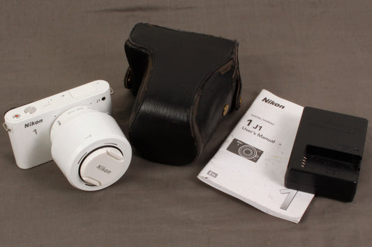 Nikon 1 J1 Mirrorless Digital Camera w 30-110mm Zoom Lens, Charger, Case, Manual