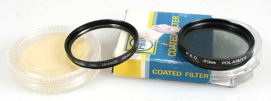 49MM POLARIZER AND UV-HAZE FILTER IN ORIG. CASE