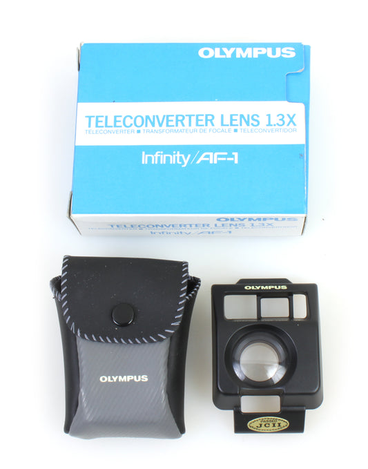 OLYMPUS TELECONVERTER LENS 1.3X INFINITY AF-1, W BOX AND INSTRUCTION SHEET