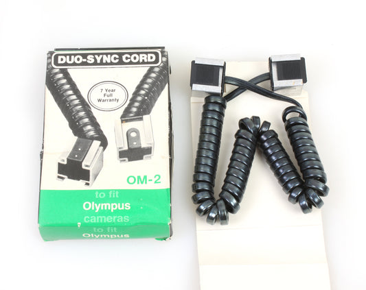 ALTREX DUO-SYNC CORD FOR OLYMPUS OM-2 COILED HOT SHOE TO HOT SHOE IN BOX