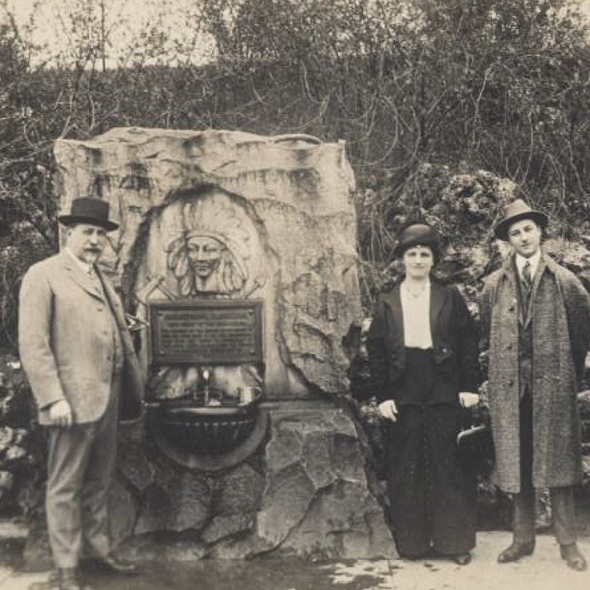 Vintage Black and White Post Card Of White People Posing In Front Of Native American Memorial