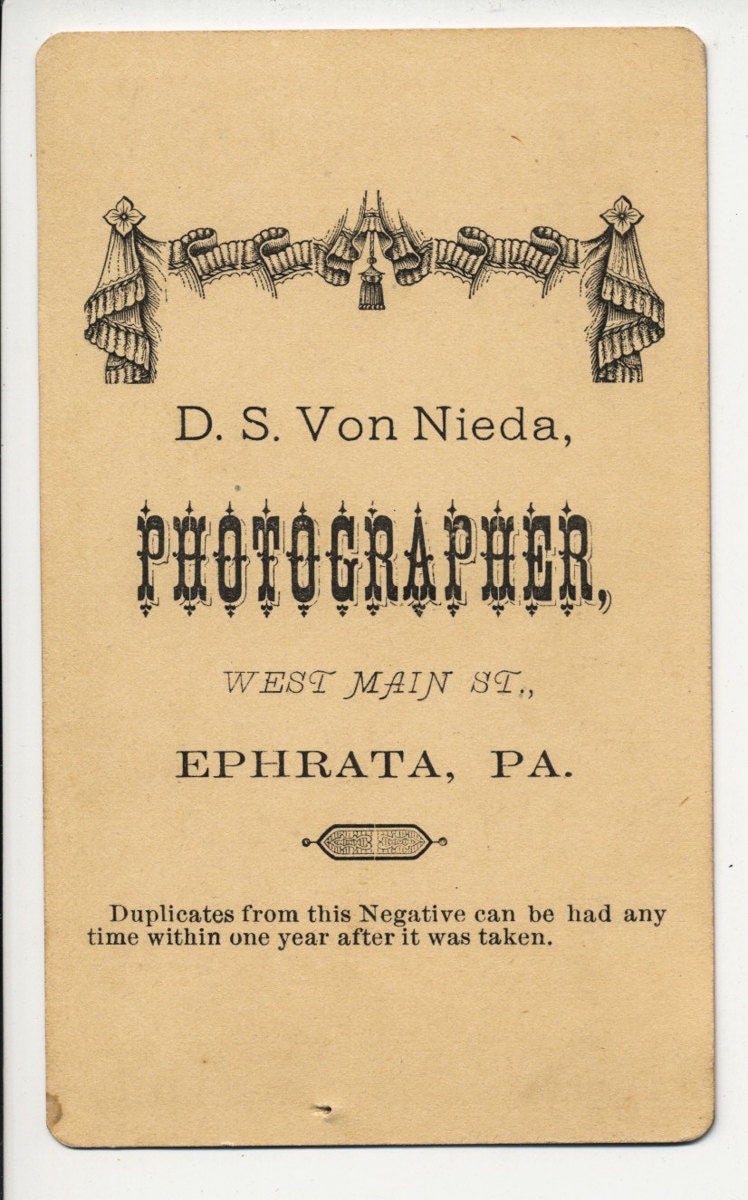CDV Antique 1800s Photograph Of Sullen Baby In White Dress in Pennsylvania//Unhappy Baby//Center Parted Hair//Vintage Baby Portrait