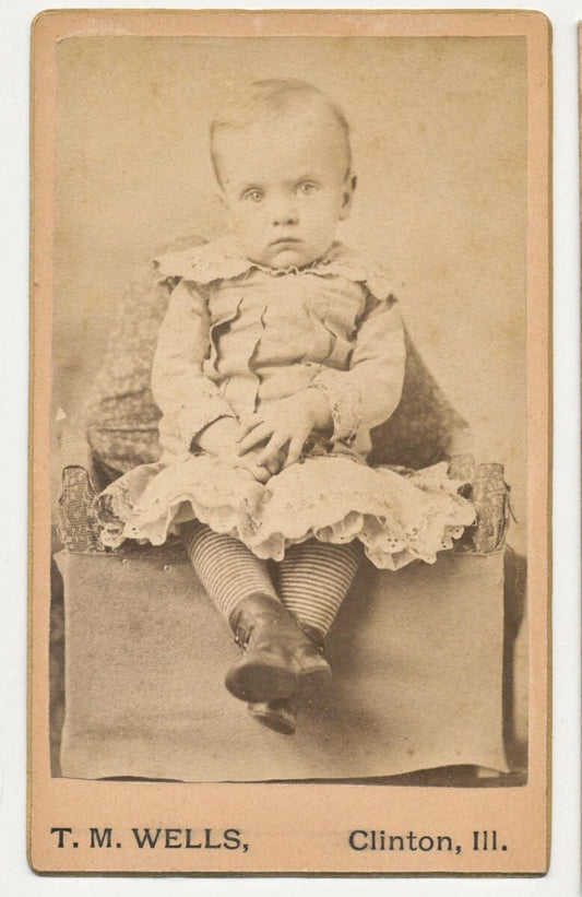 CDV Card Photo From The 1800s of Pouty Toddler Girl Wearing Striped Stockings
