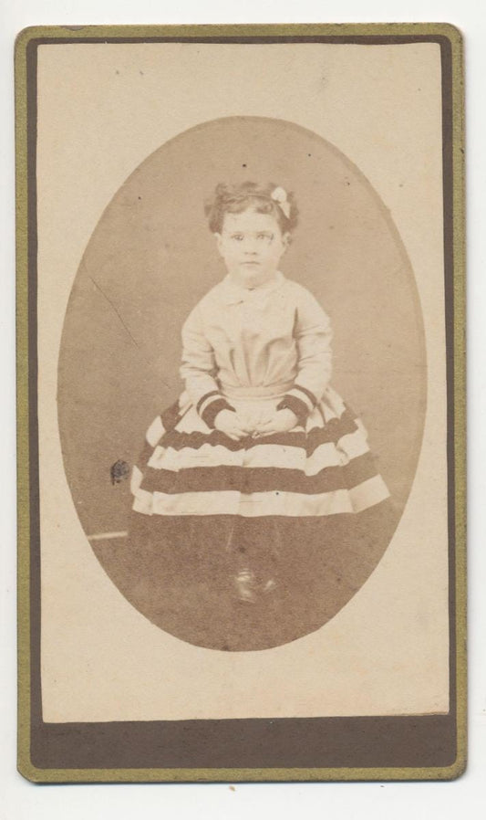 CDV Photo From The 1800s of Curly Haired Girl With Bow and Striped Skirt//Pennsylvania CDV Portrait//Big Eyed Little Girl