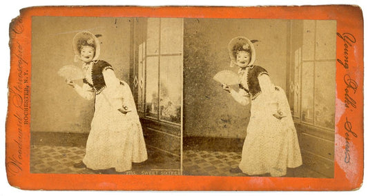 Damaged Stereoview of Masked Woman w/ Fan - Fire Damaged