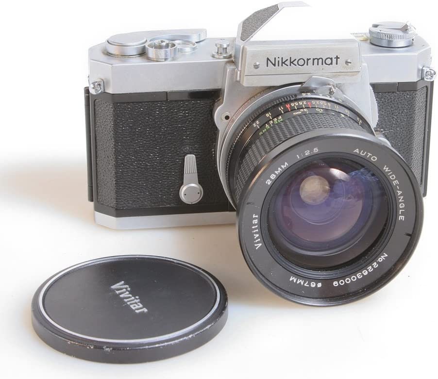 Nikon film camera  Nikkormat FT W/ 28MM F 2.5 Lens w/Front Cap