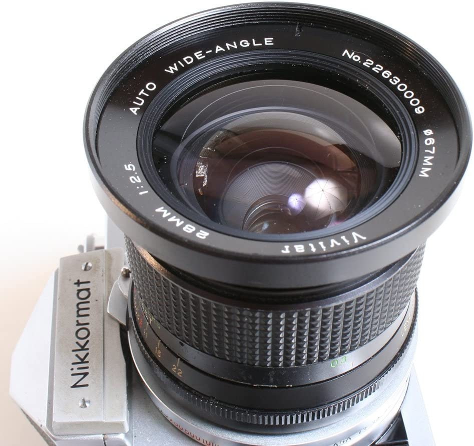 Nikon film camera  Nikkormat FT W/ 28MM F 2.5 Lens w/Front Cap