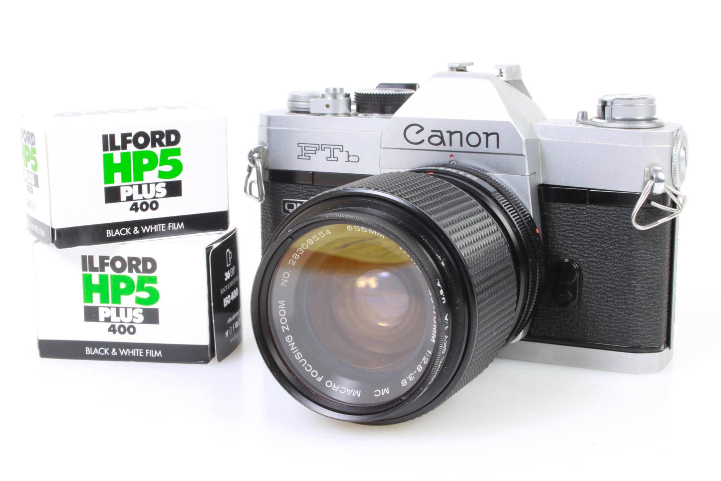 35mm Canon Student Camera W 35-75mm lens and 2 Pack of B&W Film TESTED WORKING