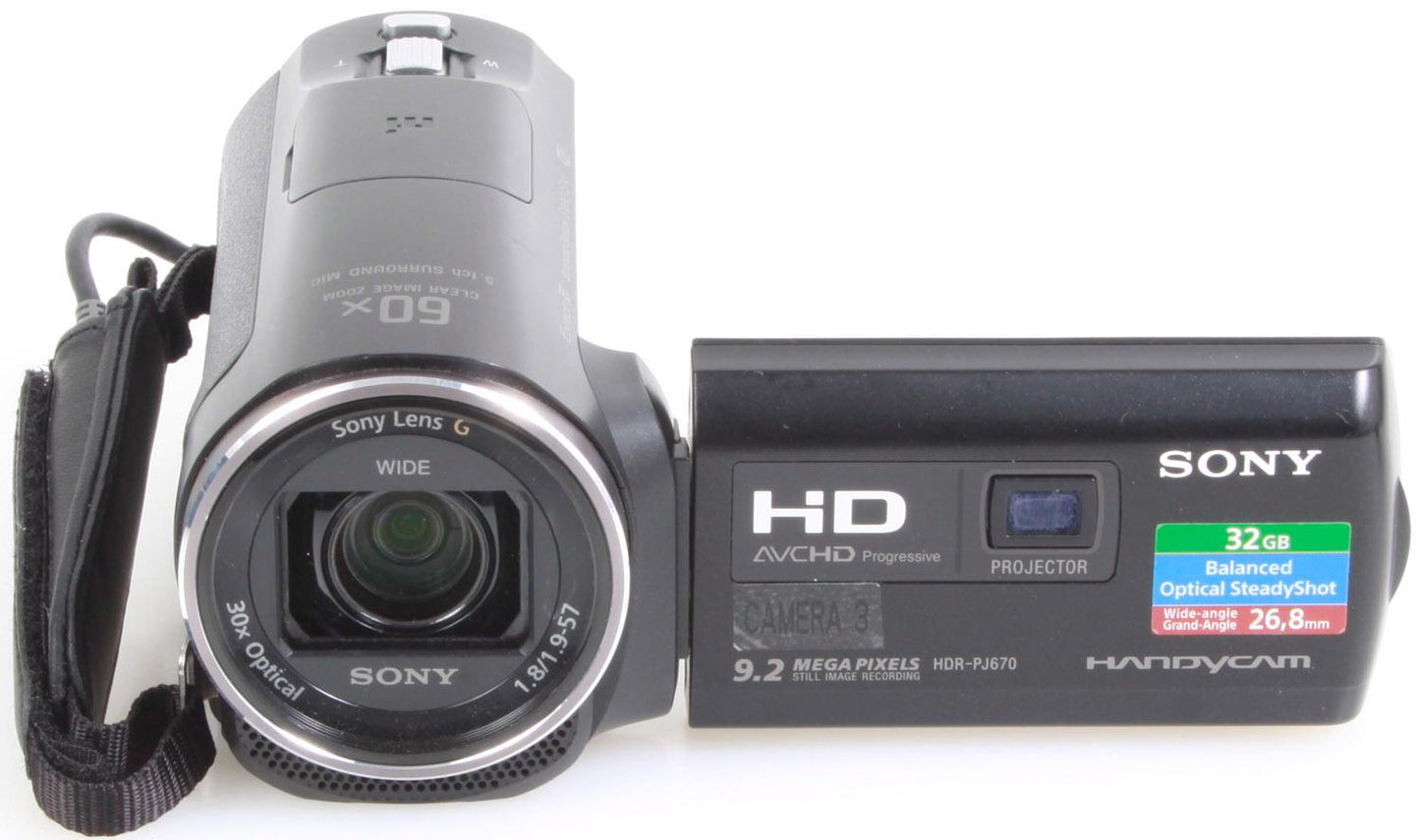 Sony Handycam w/ Built in Projector, Batteries, Cords, Case