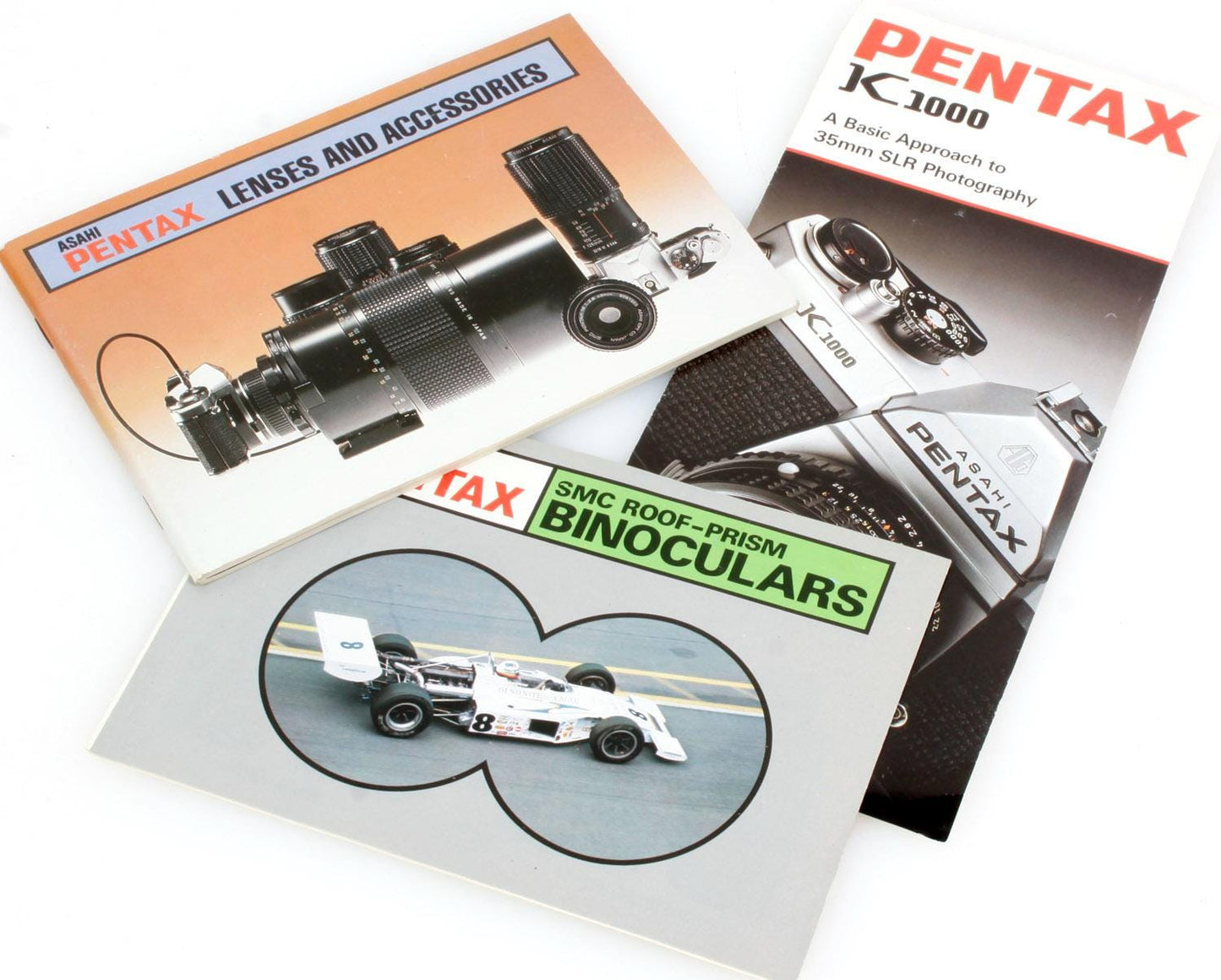 Pentax K1000, Binocular and Lens Booklet Lot of 3