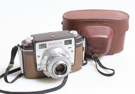 KODAK CAMERA W/ORIGINAL BROWN LEATHER CASE AND STRAP DISPLAY