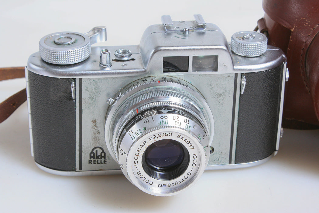 FILM CAMERA W/ORIGINAL BROWN LEATHER CASE AND STRAP, DISPLAY ONLY