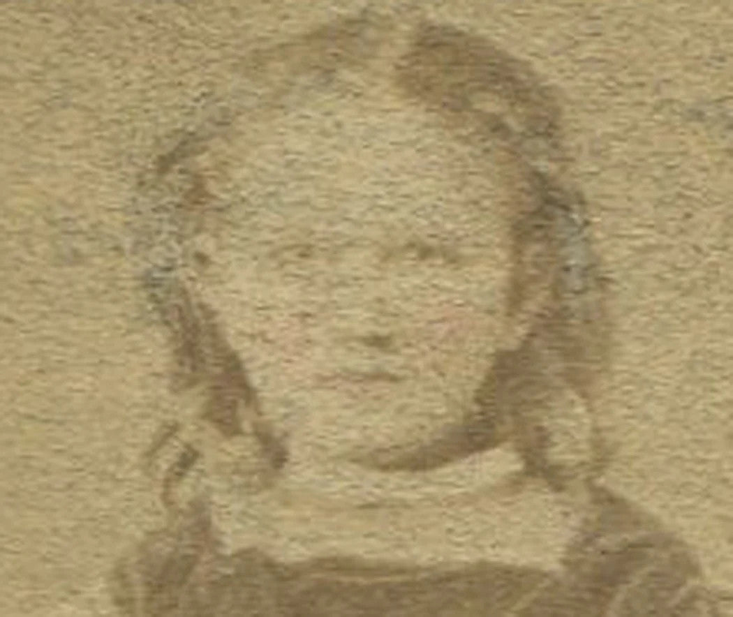 YOUNG GIRL WITH HIGH TOP SHOES, SEATED AT TABLE. TINTED CDV.