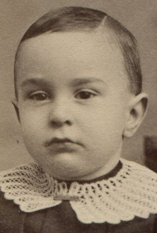 CHILD, LACE COLLAR, VERY SHORT HAIR. CDV. PAWTUCKET, R.I.