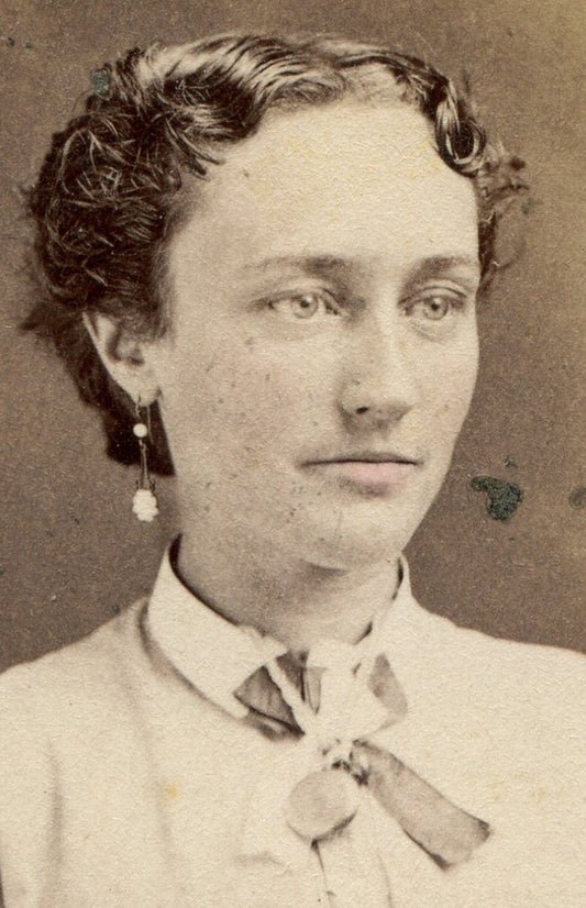 WOMAN WITH SHORT TOUSLED HAIR, LONG EARRINGS. CDV, FORT EDWARD, N.Y.
