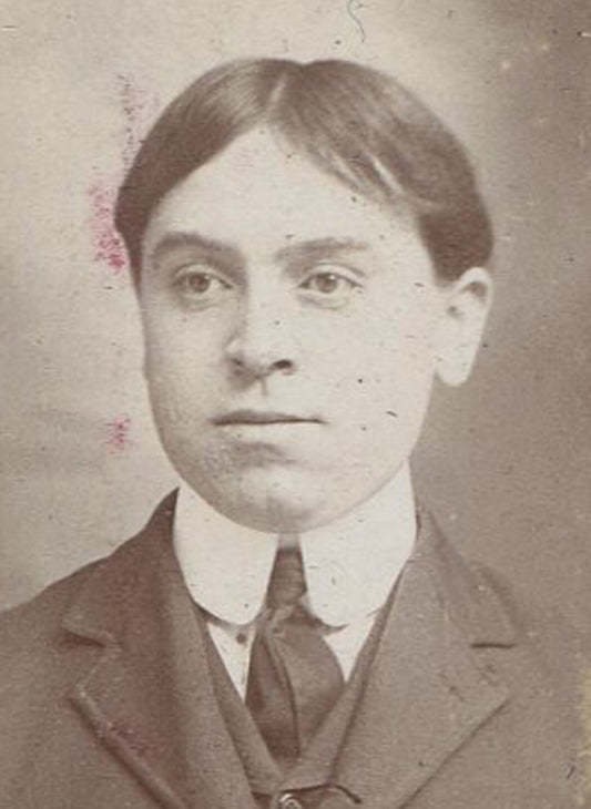 Vintage photo cabinet card portrait - oval silver print, 1900s gentleman with