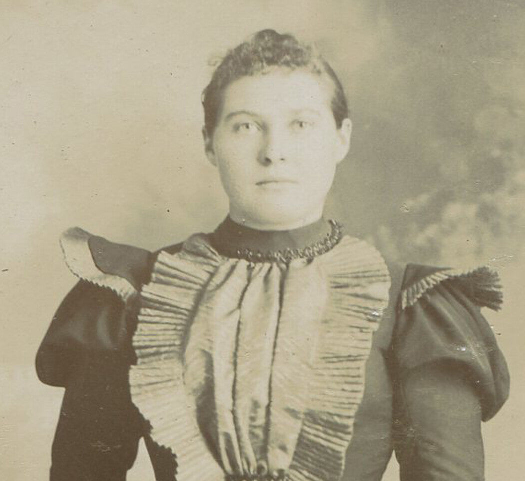 STURDY WOMAN IN STIFF POSE. CABINET CARD, TRAVERSE, MICHIGAN.