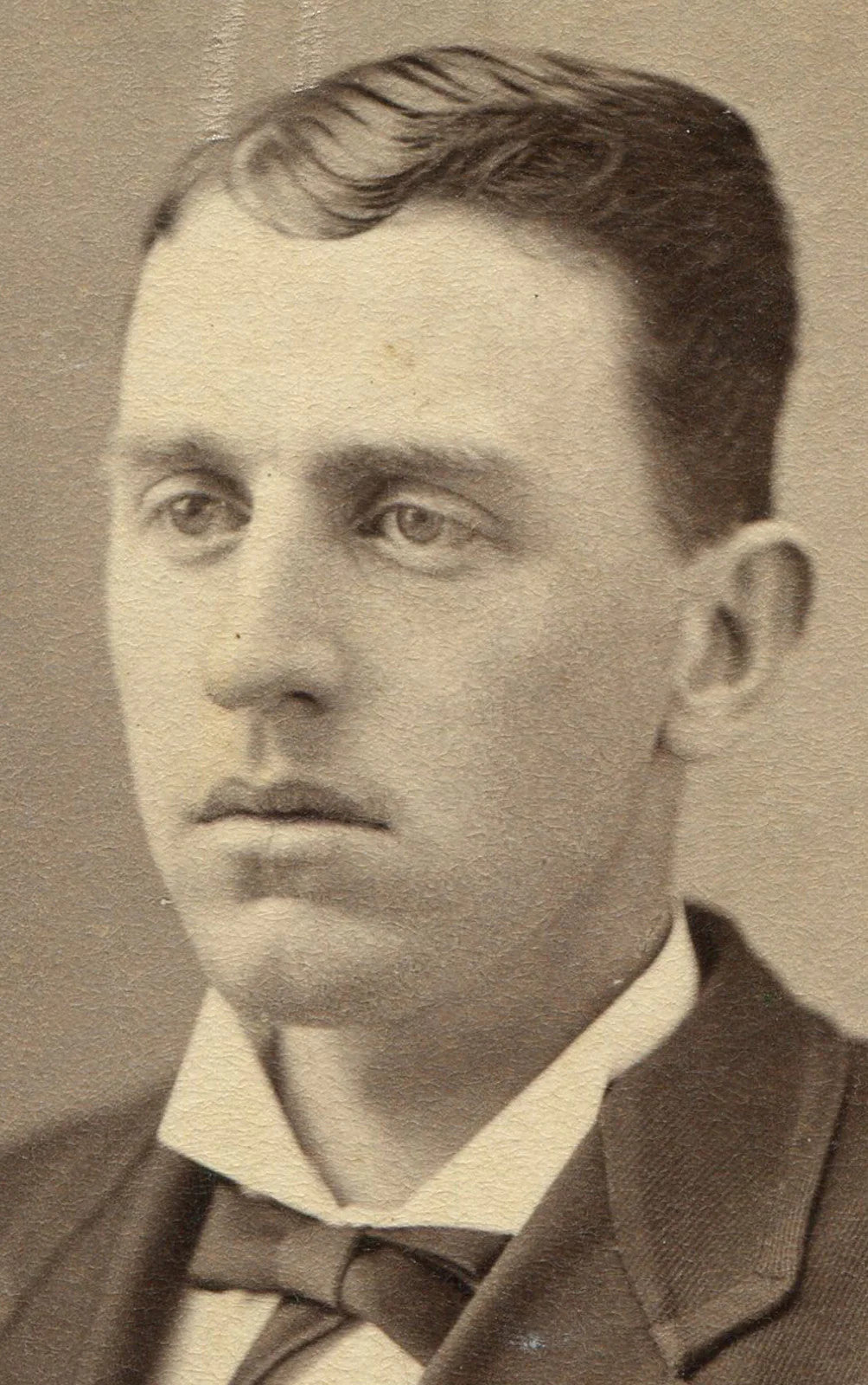 LONG FACED MAN, SUIT WITH TRIMMED LAPELS. CDV. ONCONIA, N.Y.