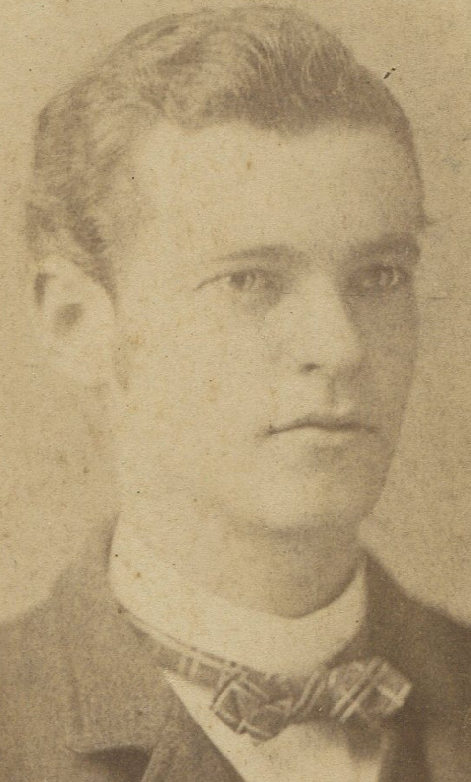 Collectible vintage cabinet card photo: Handsome young man with wavy hair, plaid