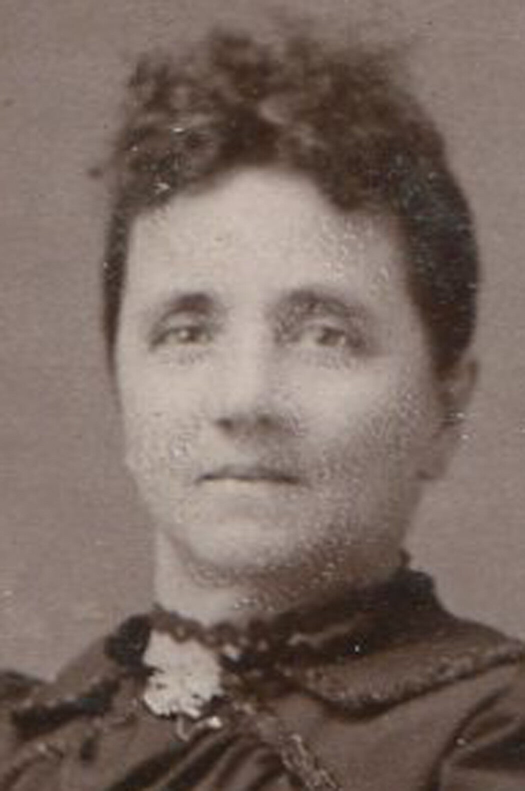 Vintage cabinet card photo: stiffly posed woman, original studio portrait, late