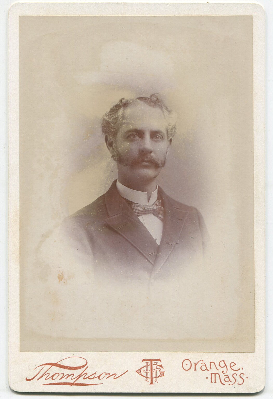 Vintage cabinet card portrait: man with gel curls & mustache, sideburns, Orange,