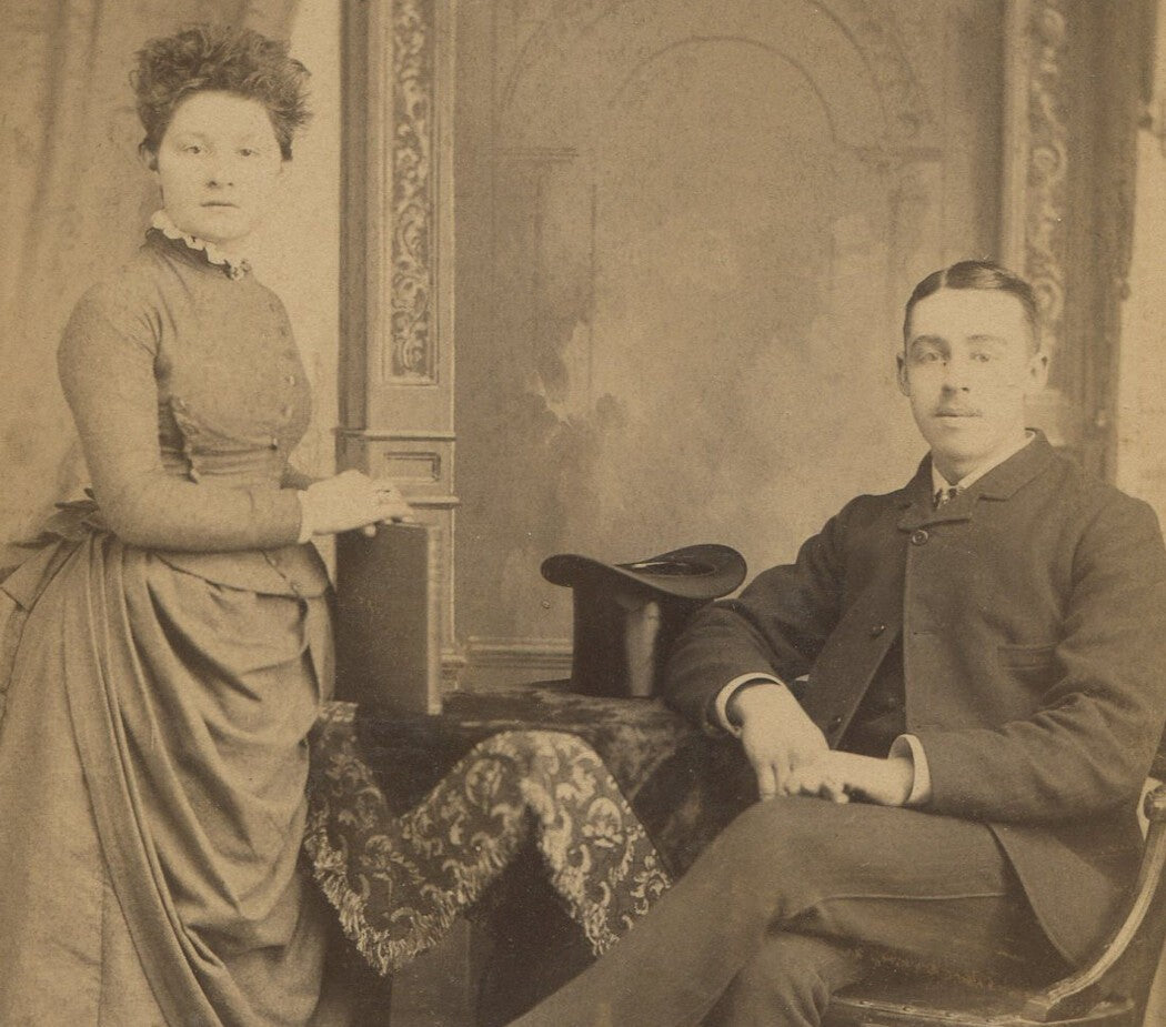 Vintage cabinet card photo: Man with top hat seated, wife nearby - Tyrone PA,