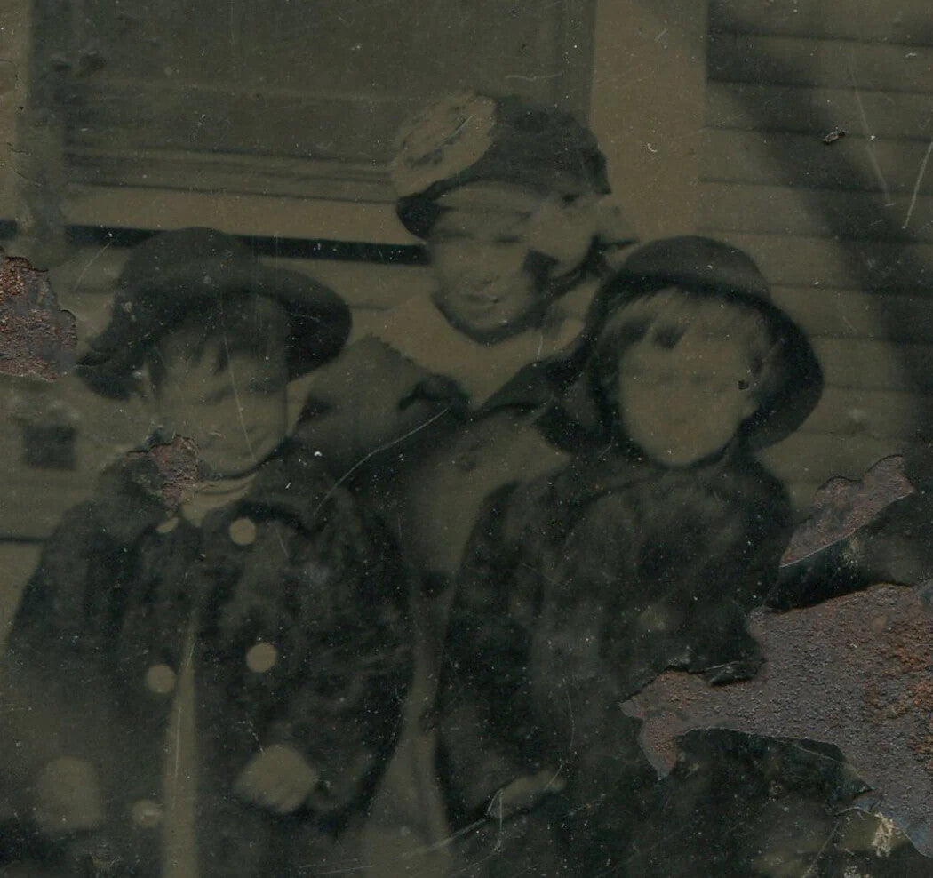 Vintage Tintype Photo: Three Young Children in Hats Squinting in Sunlight