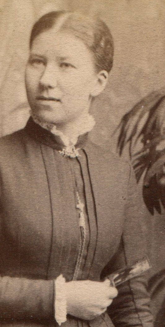 WOMAN, MYSTERY SMILE, HOLDING MYSTERY OBJECT. CDV. STOCKHOLM, SWEDEN.