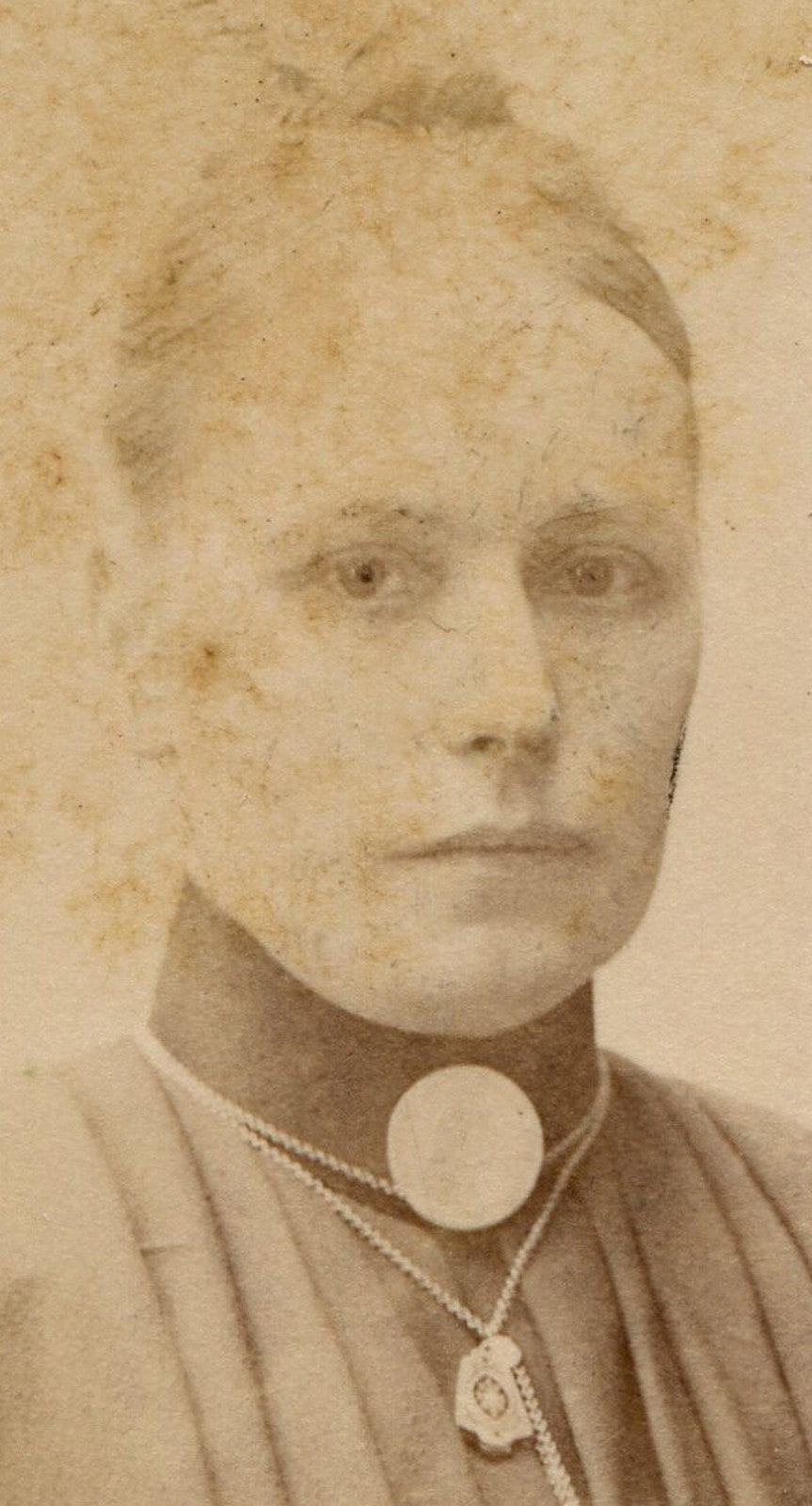 SERIOUS WOMAN IN EXTREMELY PLEATED DRESS. CDV. STOCKHOLM, SWEDEN.