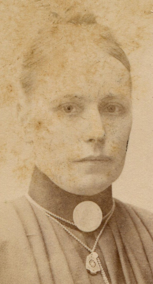 SERIOUS WOMAN IN EXTREMELY PLEATED DRESS. CDV. STOCKHOLM, SWEDEN.