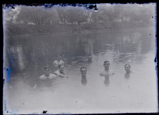 MEN SWIMMING/STANDING, HEADS ABOVE WATER. 5X7 GLASS PLATE NEGATIVE.