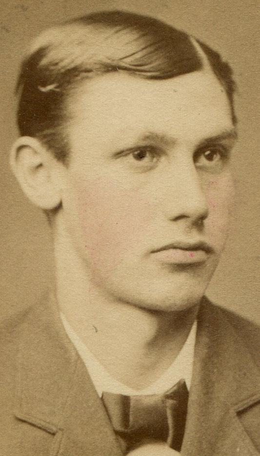 YOUNG MAN, FULL LIPS, TIGHT SUIT, BOW TIE. TINTED CDV.