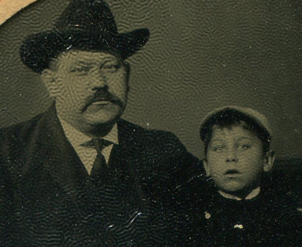 FATHER W/ YOUNG SON, BOTH IN HATS. TEXTURED TINTYPE, PERIOD PAPER MAT.